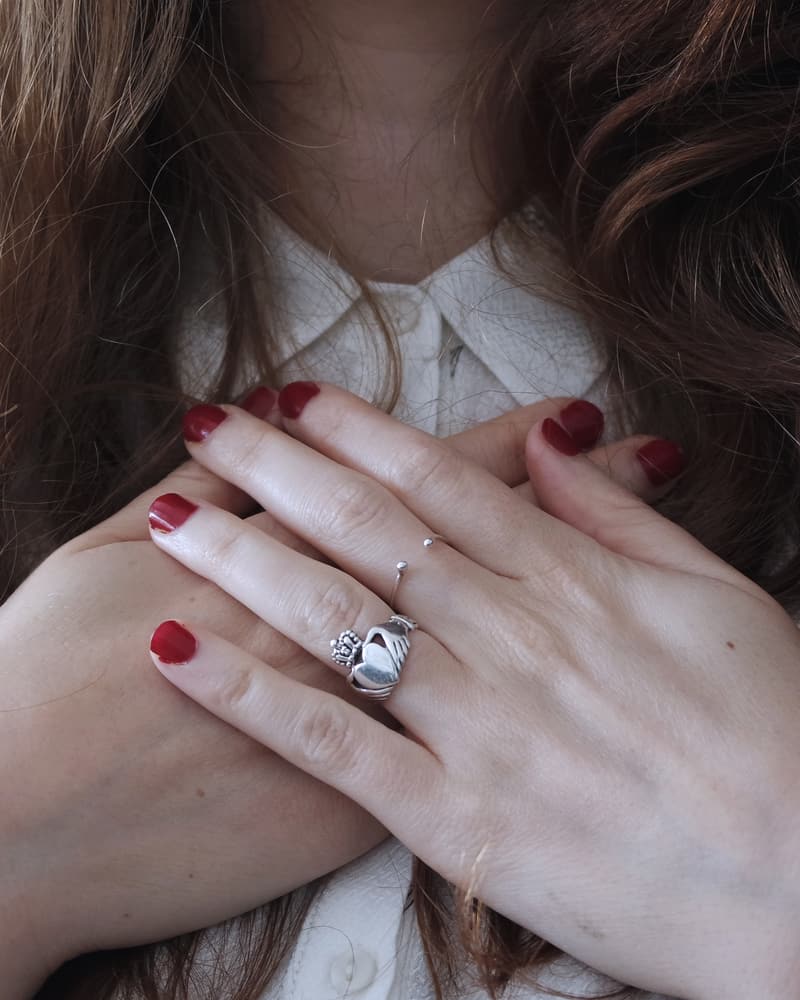 Short almond nails in a classic red gel